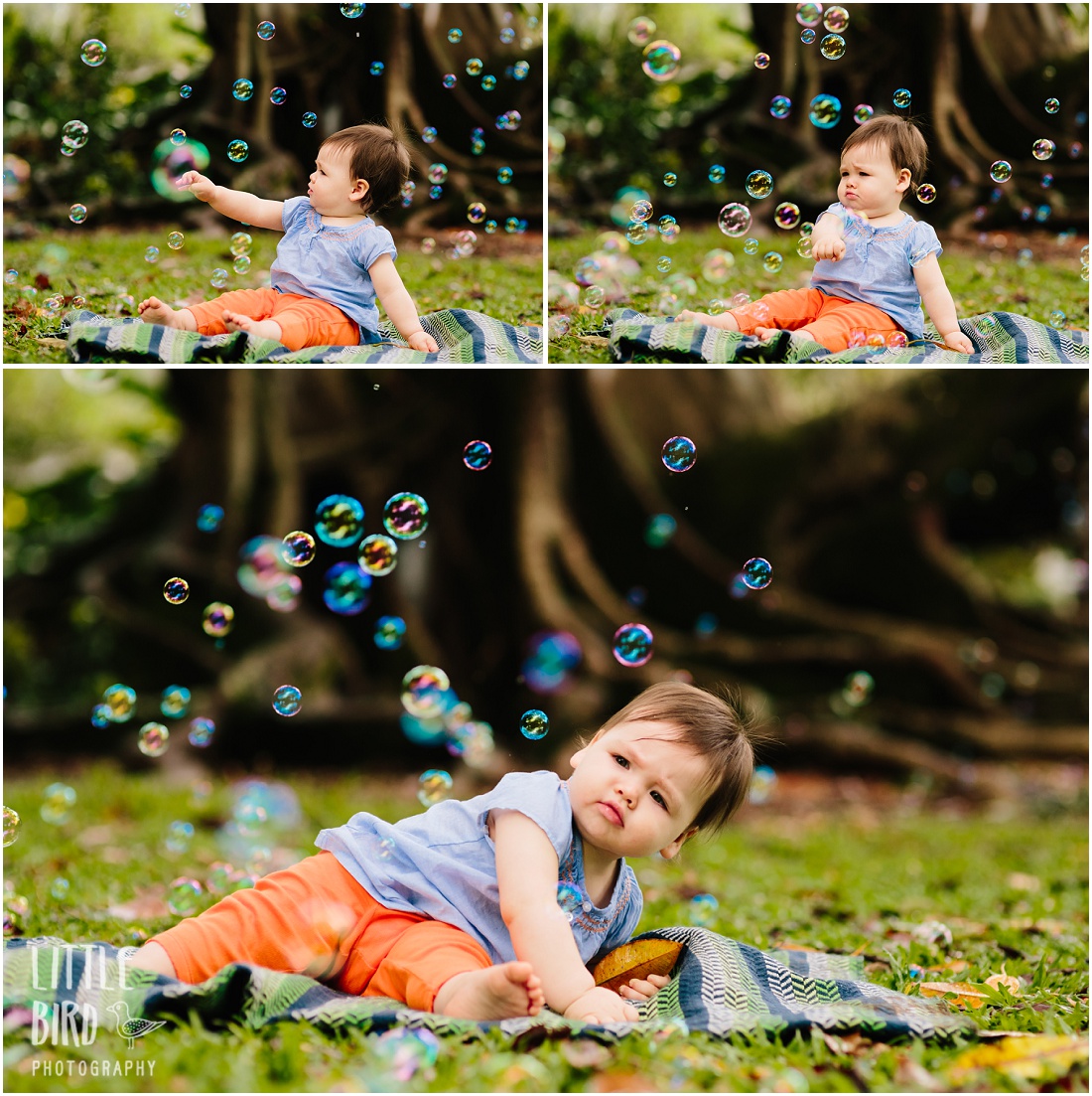 baby playing with bubbles in hawaii