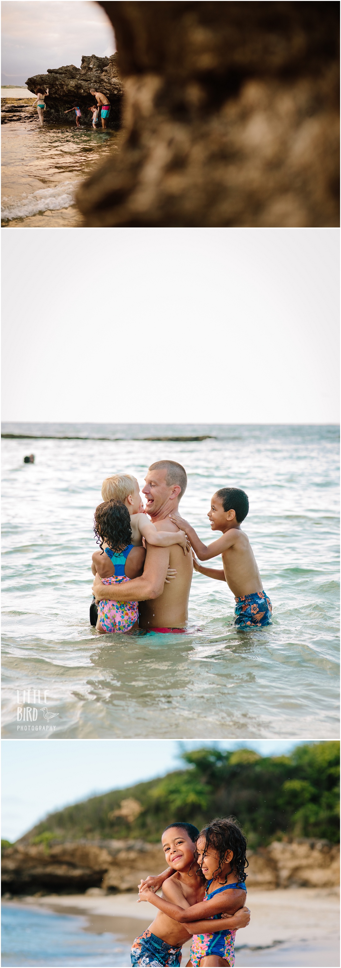 family playing in the ocean in hawaii