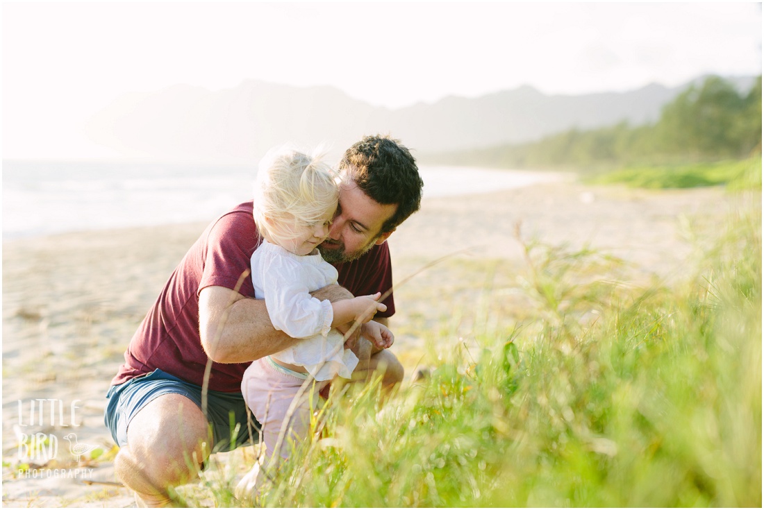 dad and baby at the beach in oahu