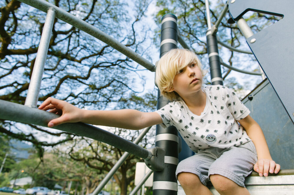 Climbing high at the newly rebuilt playground in Nuuanu Valley Park — one of Honolulu’s few updated play structures.