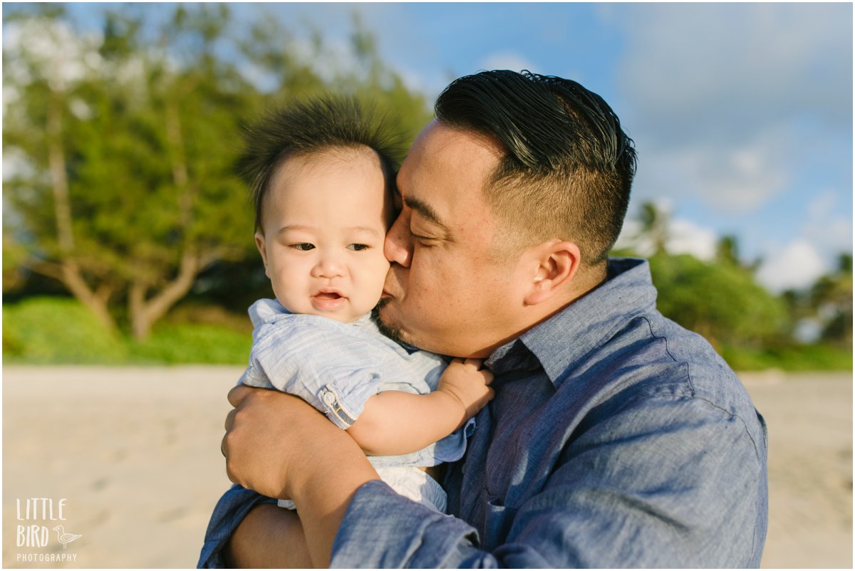 a big kiss for a little baby on the beach in kailua