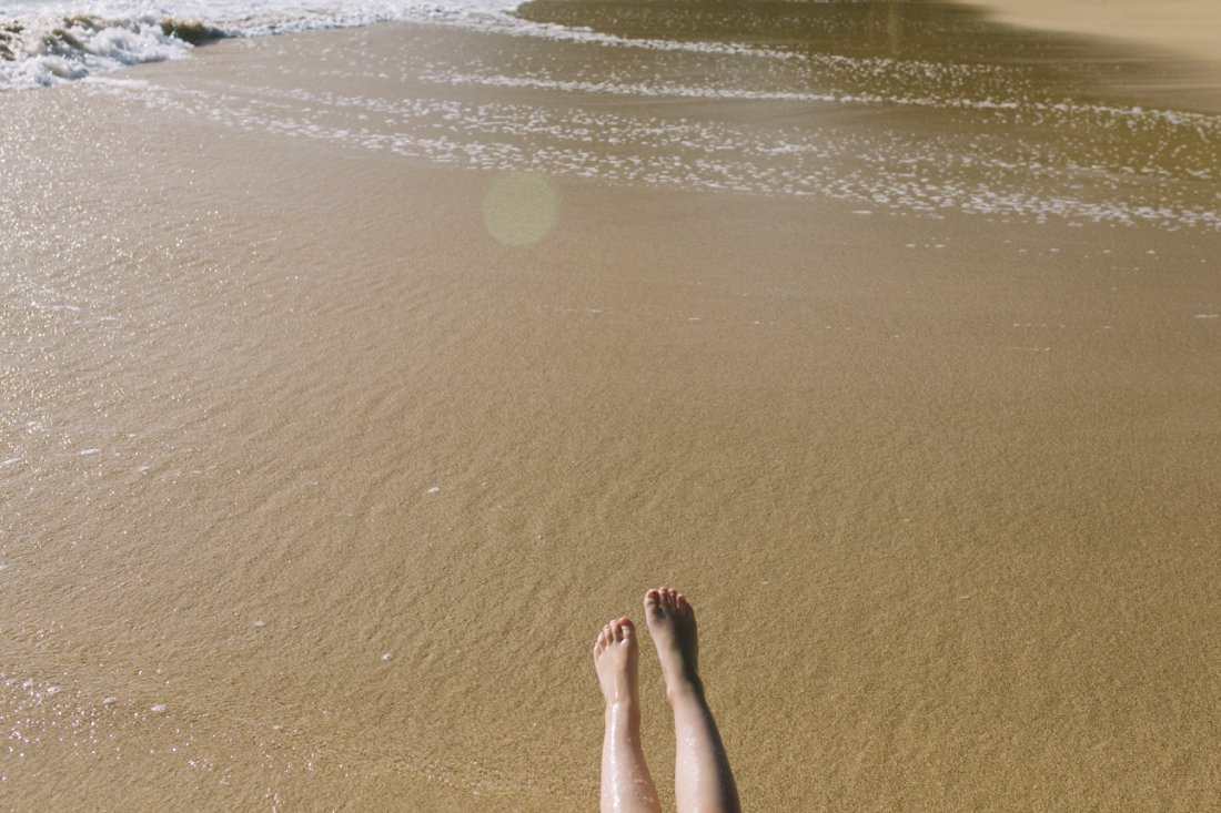 feet and sand in hawaii