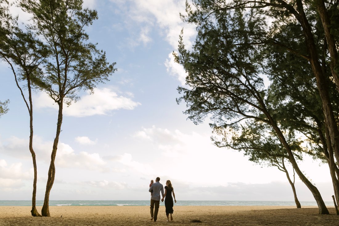 family walking towards the beach in hawaii