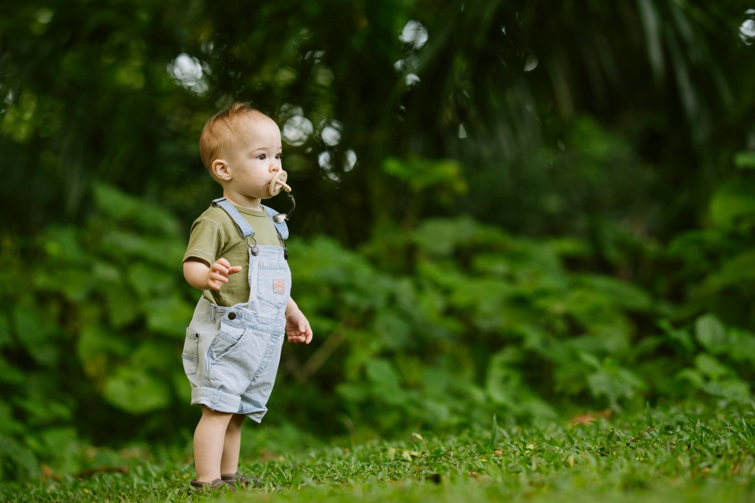 baby standing in the park