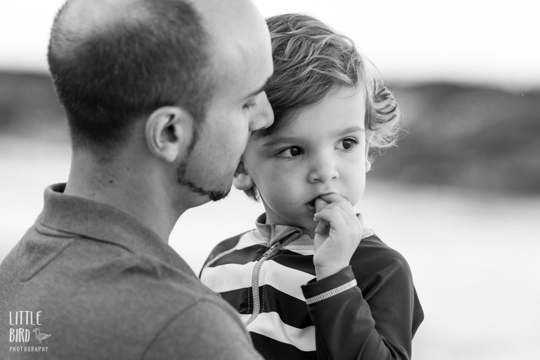 portrait of dad and son at the beach in black and white
