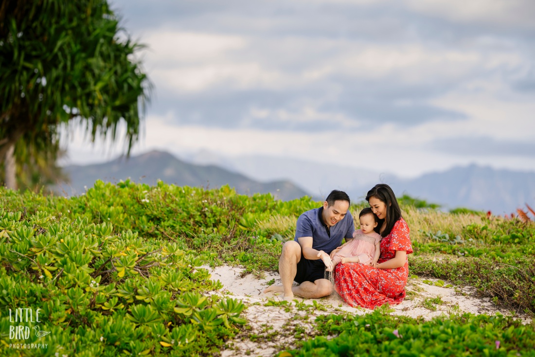 family playing at the beach captured by oahu family photographer