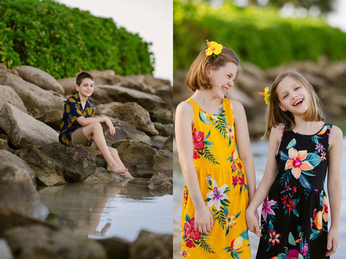 twin sisters sharing a laugh during a family photo session in hawaii