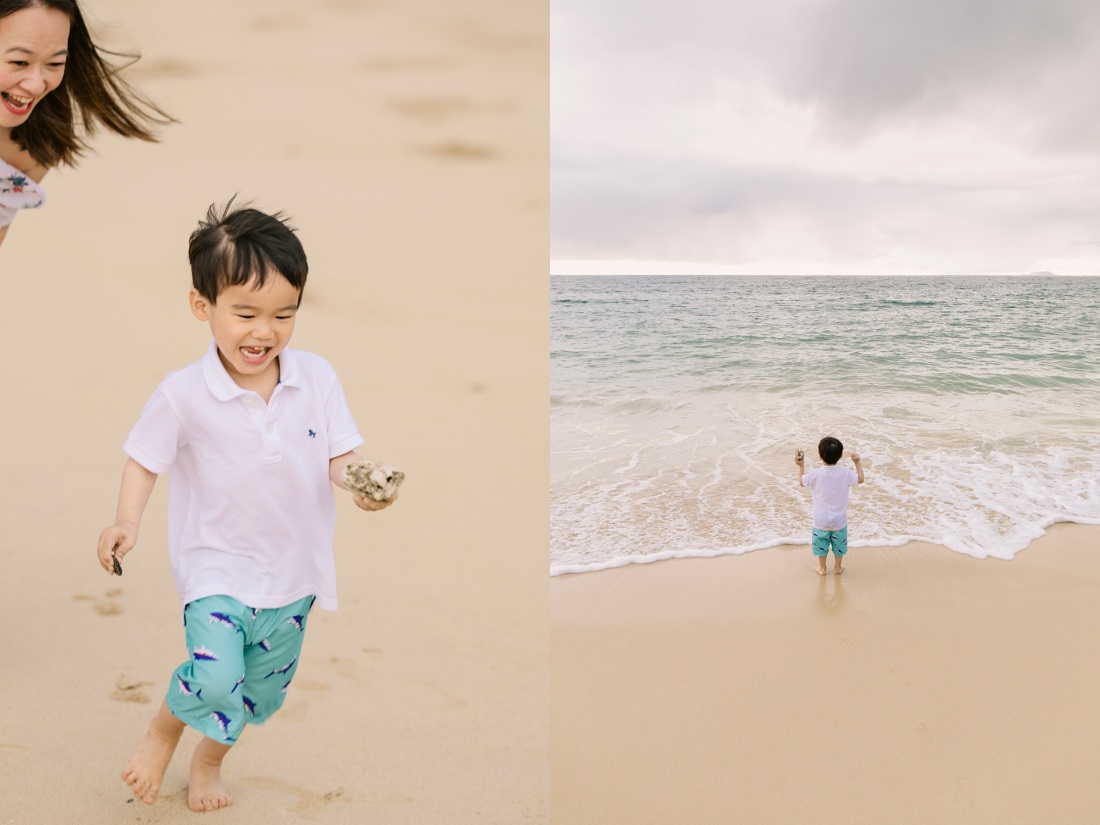 boy running on the beach in hawaii