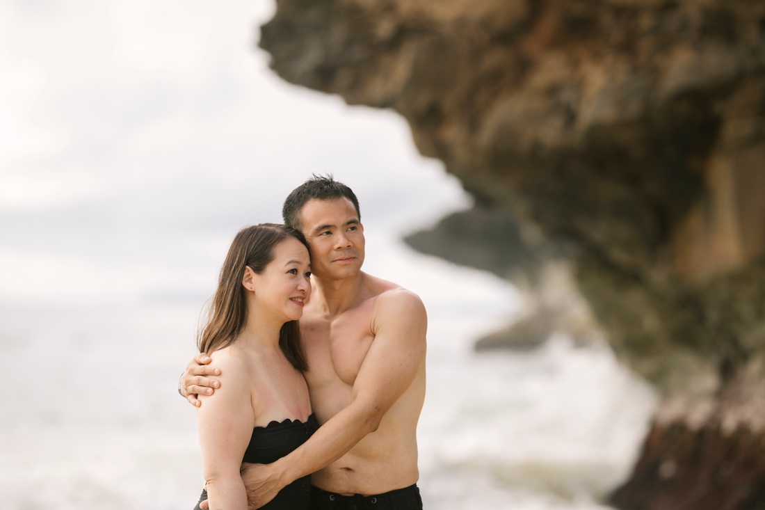couple portrait against the cliffs in hawaii