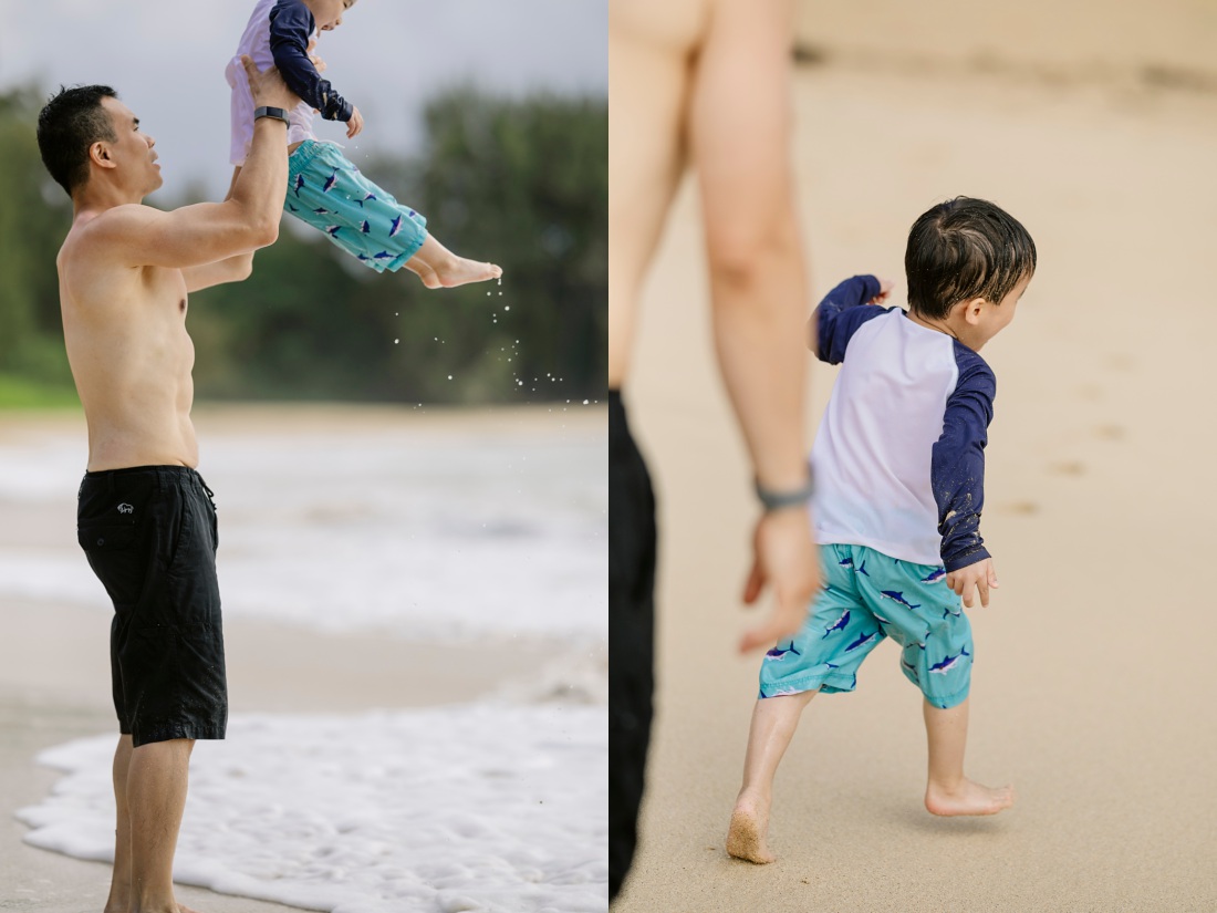 dad and son playing on the beach in hawaii