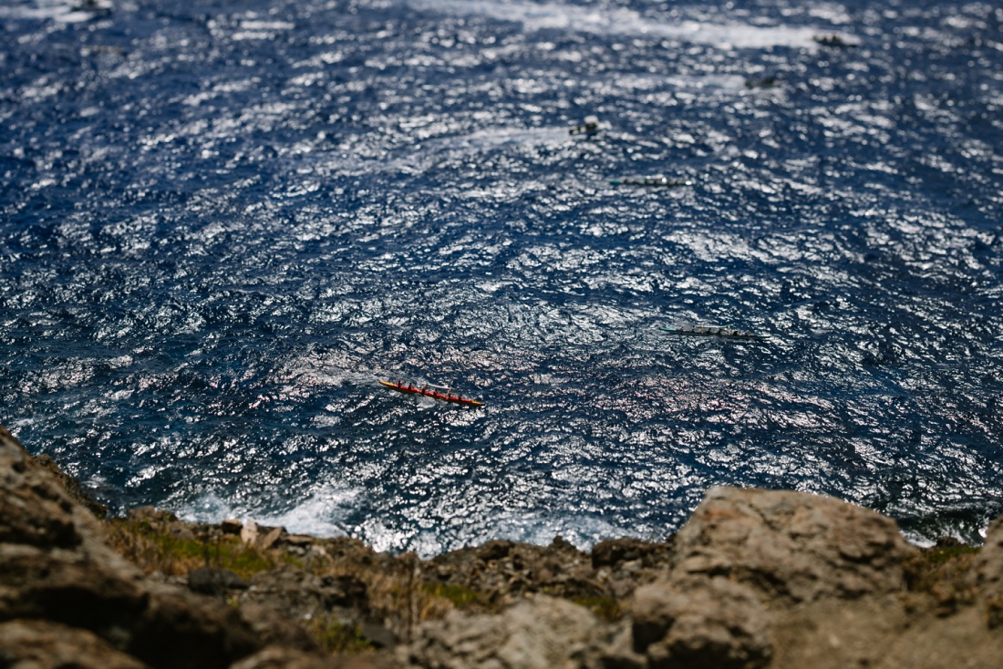 an outrigger race viewed from the cliffs at makapuu
