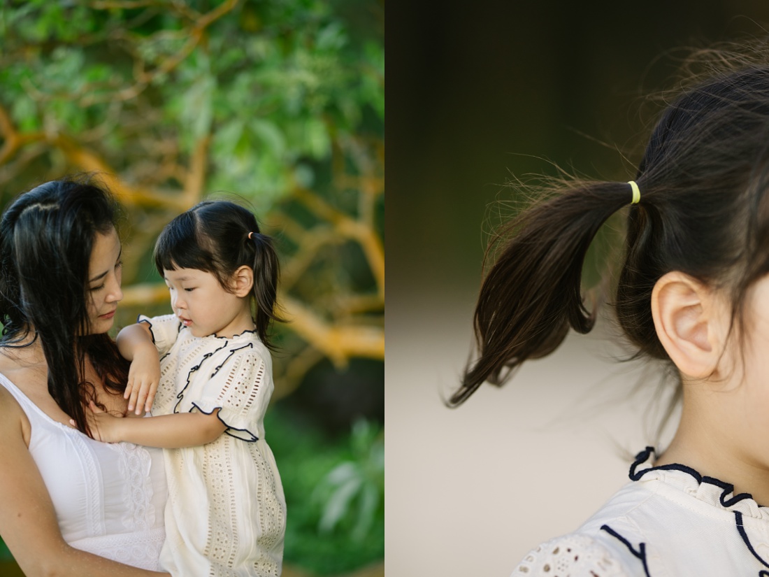 mom and daughter share a moment during a family photoshoot