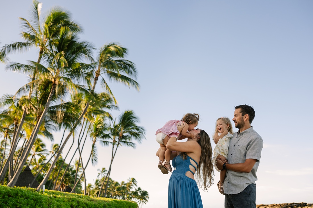 fun family portrait with palm trees in hawaii 