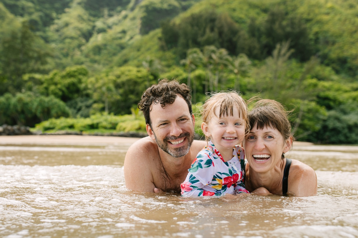 family portrait in the water at kahana bay oahu