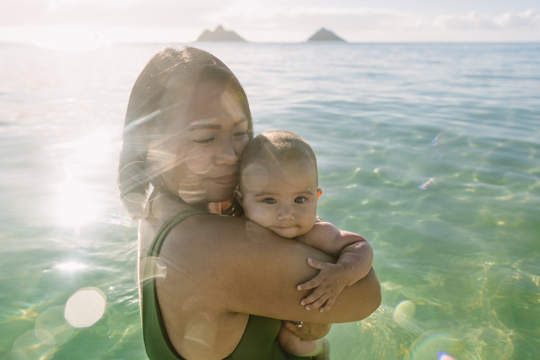 portrait of mom and baby in the water at lanikai beach