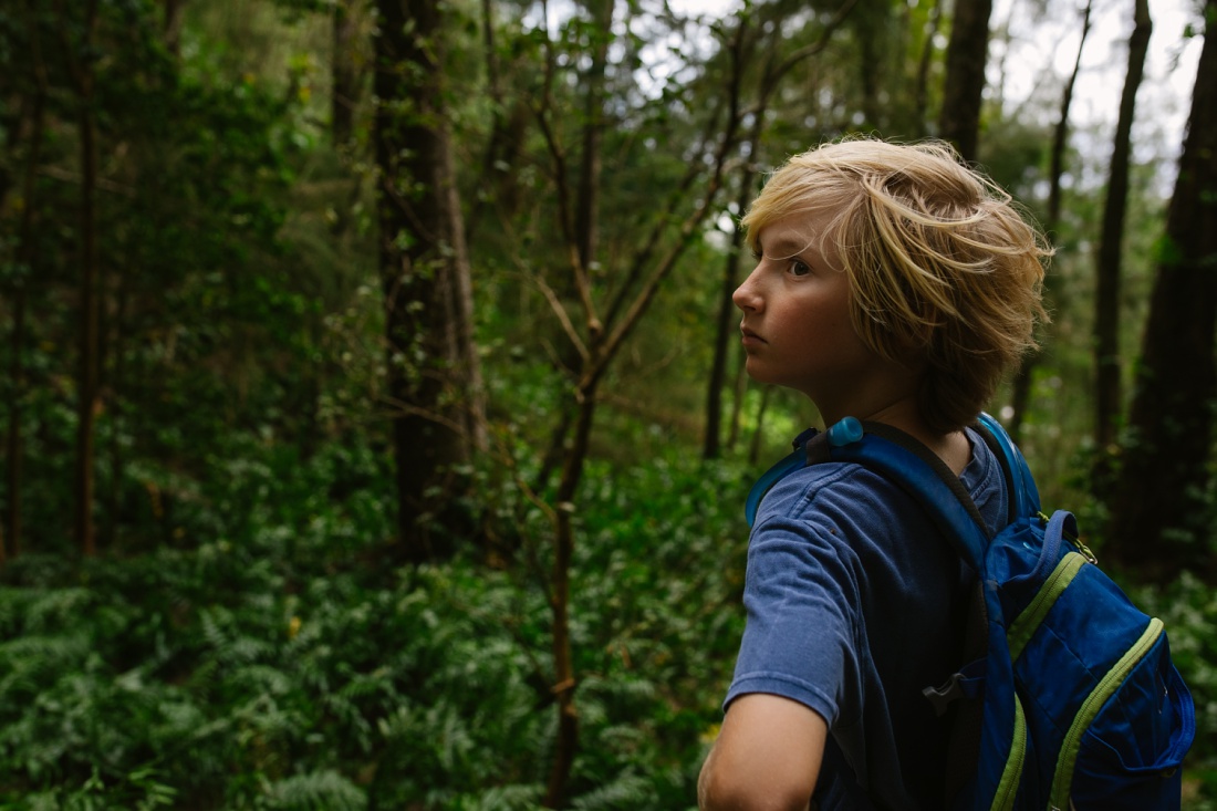 portrait of a boy hiking in oahu