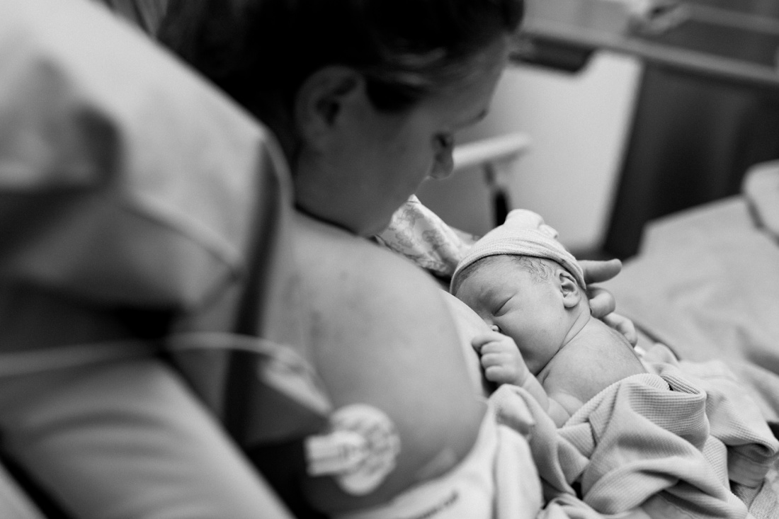 newborn baby and mom at the hospital by oahu birth photographer