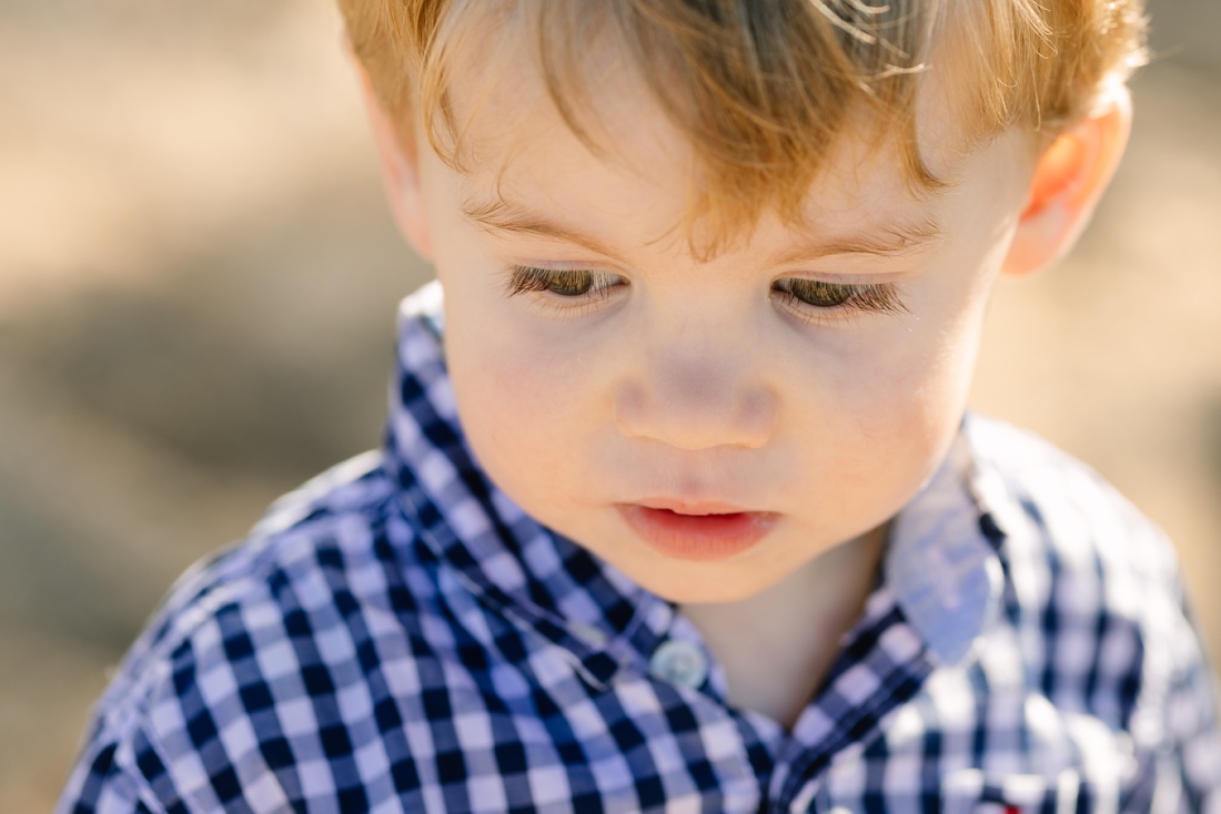 closeup portrait of a toddler boy at the beach in hawaii