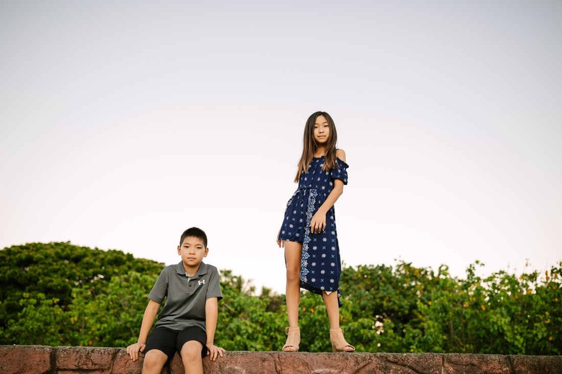 siblings standing on the levy in kailua