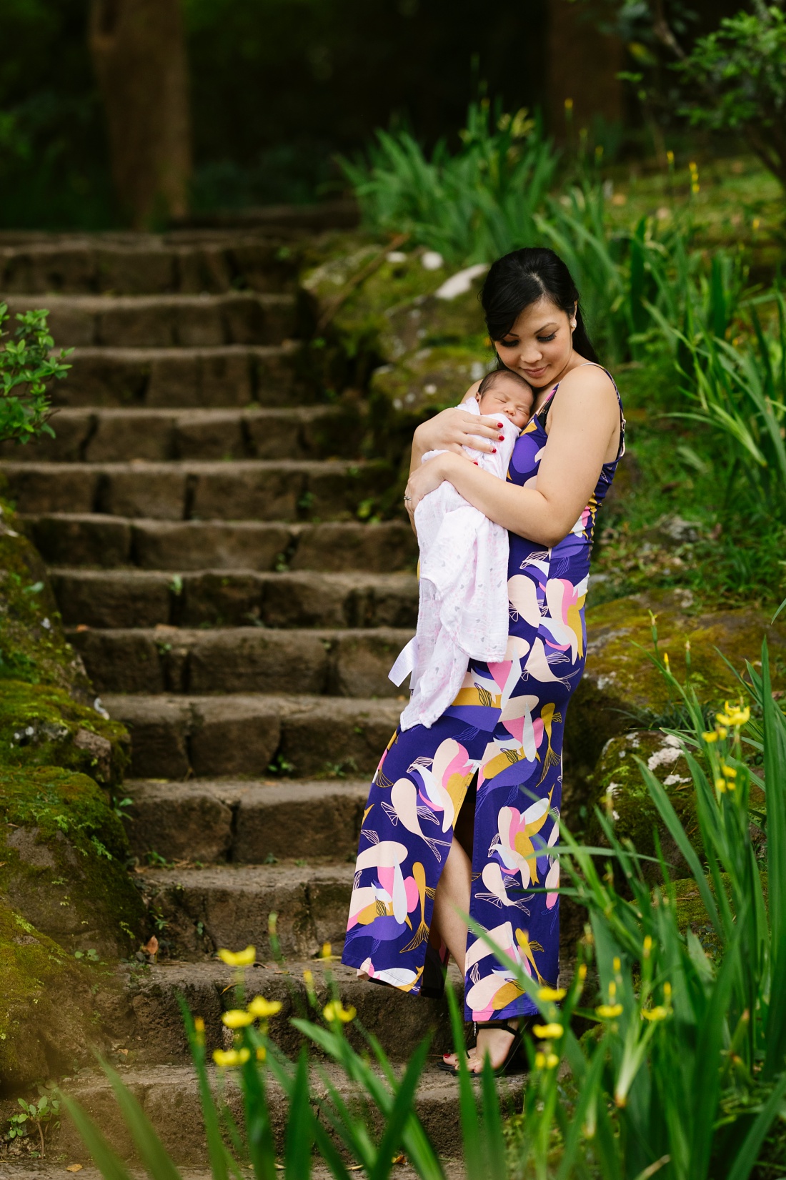 oahu newborn photographer portrait of mom and baby at byodo-in temple