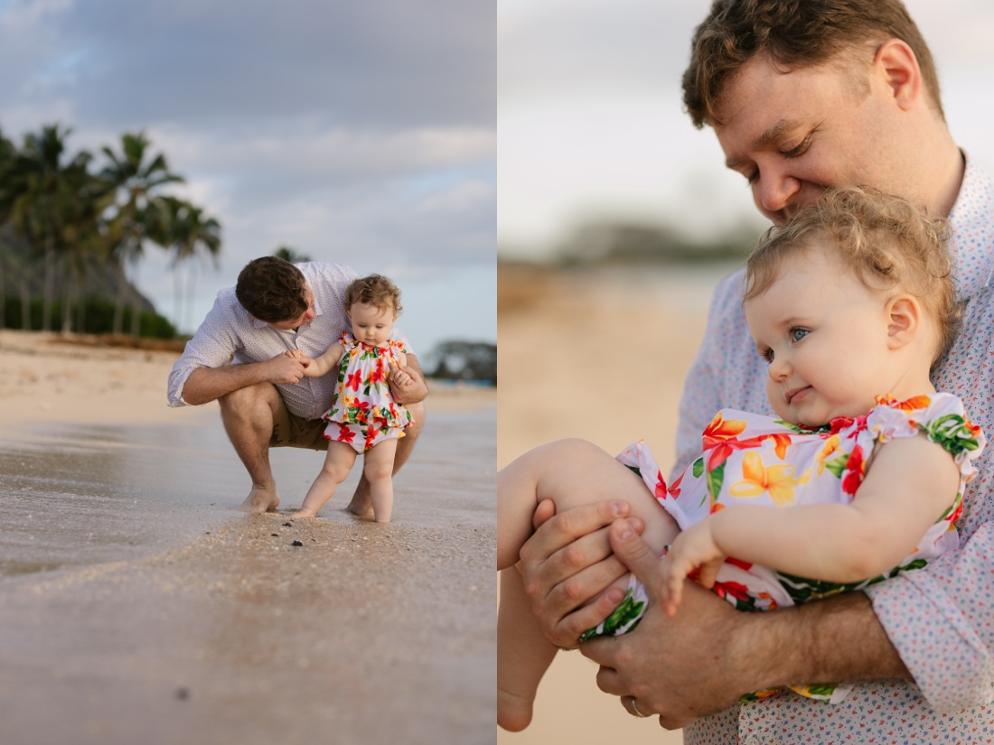 dad and baby daughter play on the beach at kualoa at sunrise