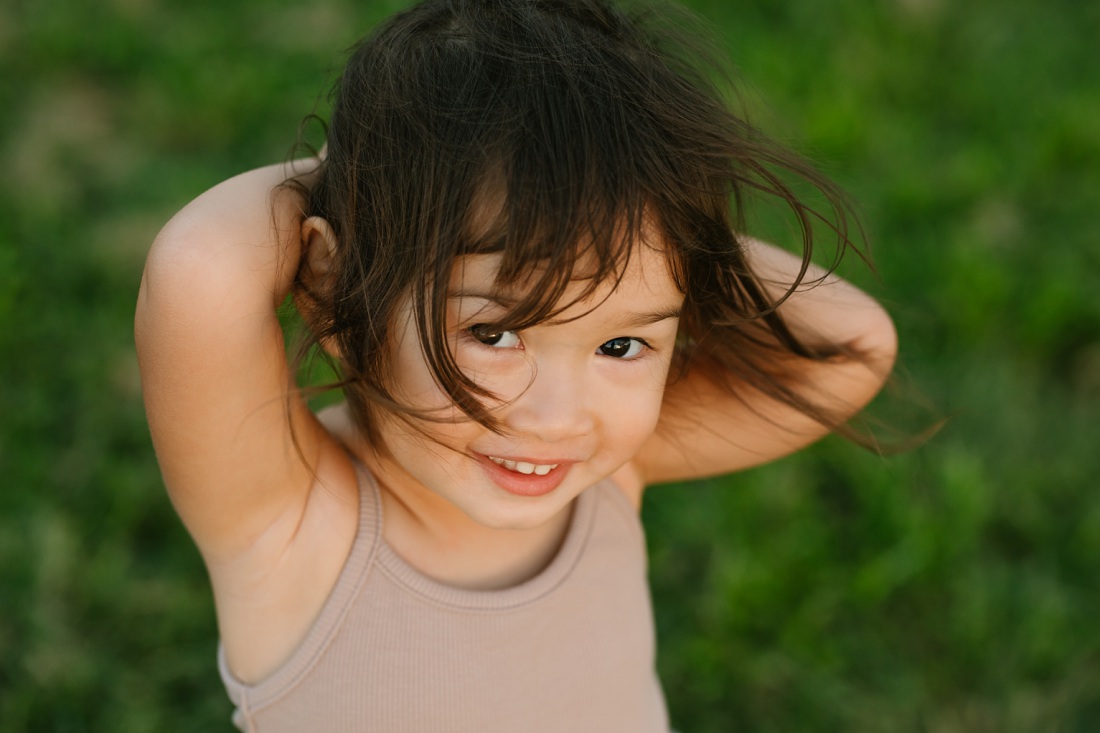 closeup portrait of a toddler girl during a family photoshoot in oahu