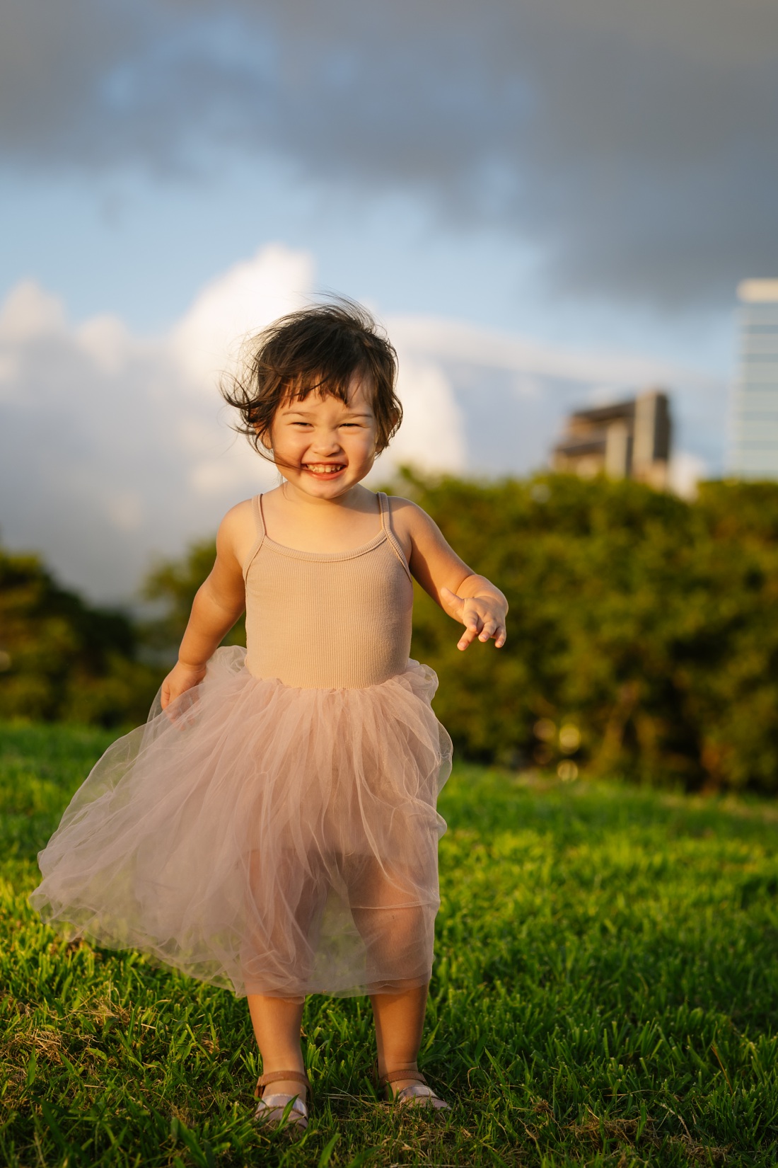 happy toddler girl at kakaako park