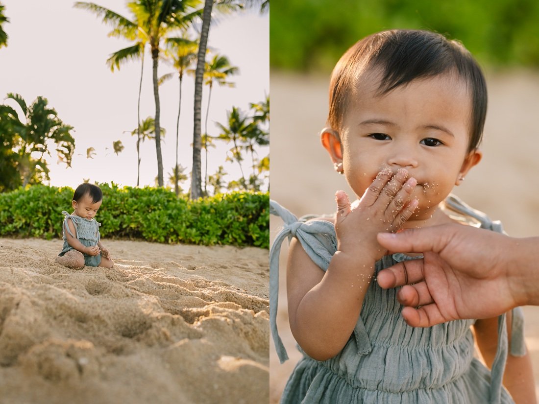 baby eating sand at the beach during a portrait session in oahu