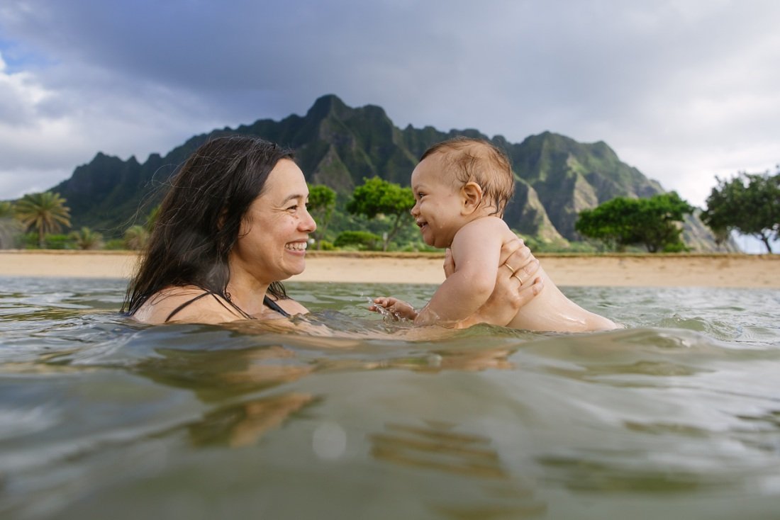 Oahu First Birthday Photo Celebration in the water at kualoa park