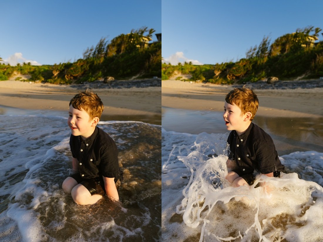 boy surprised by a wave during a family photoshoot in kapalua maui