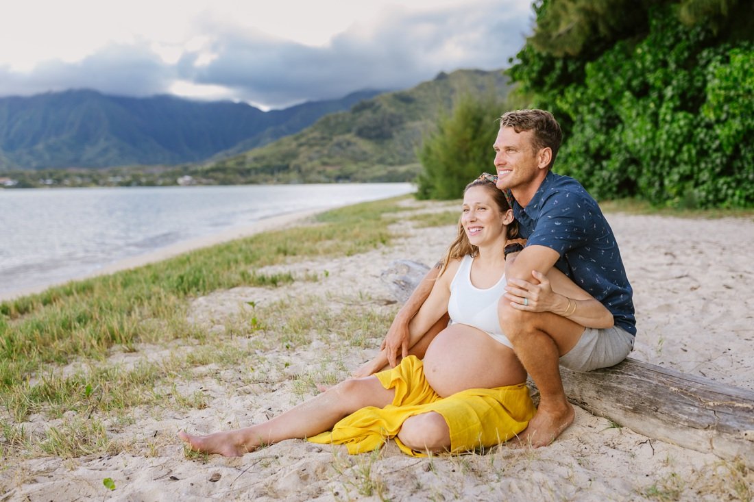 couple on the beach at kualoa