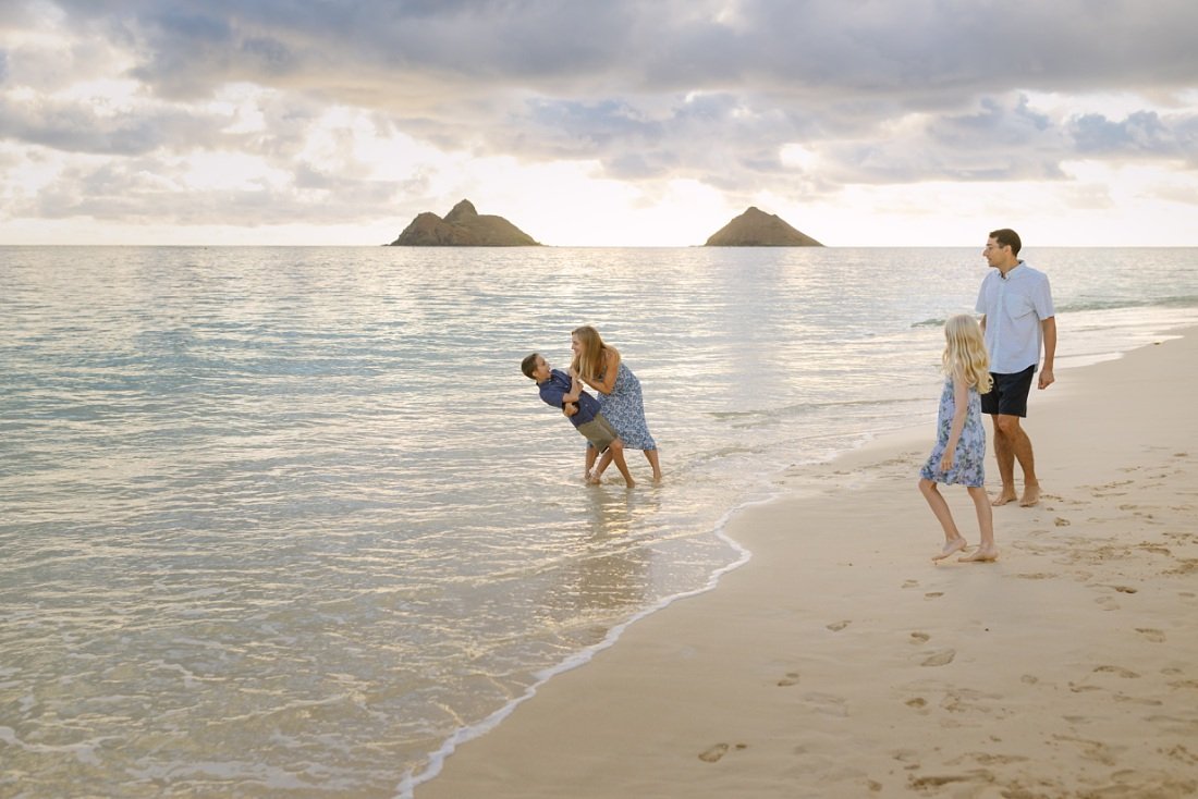 family playing at lanikai beach