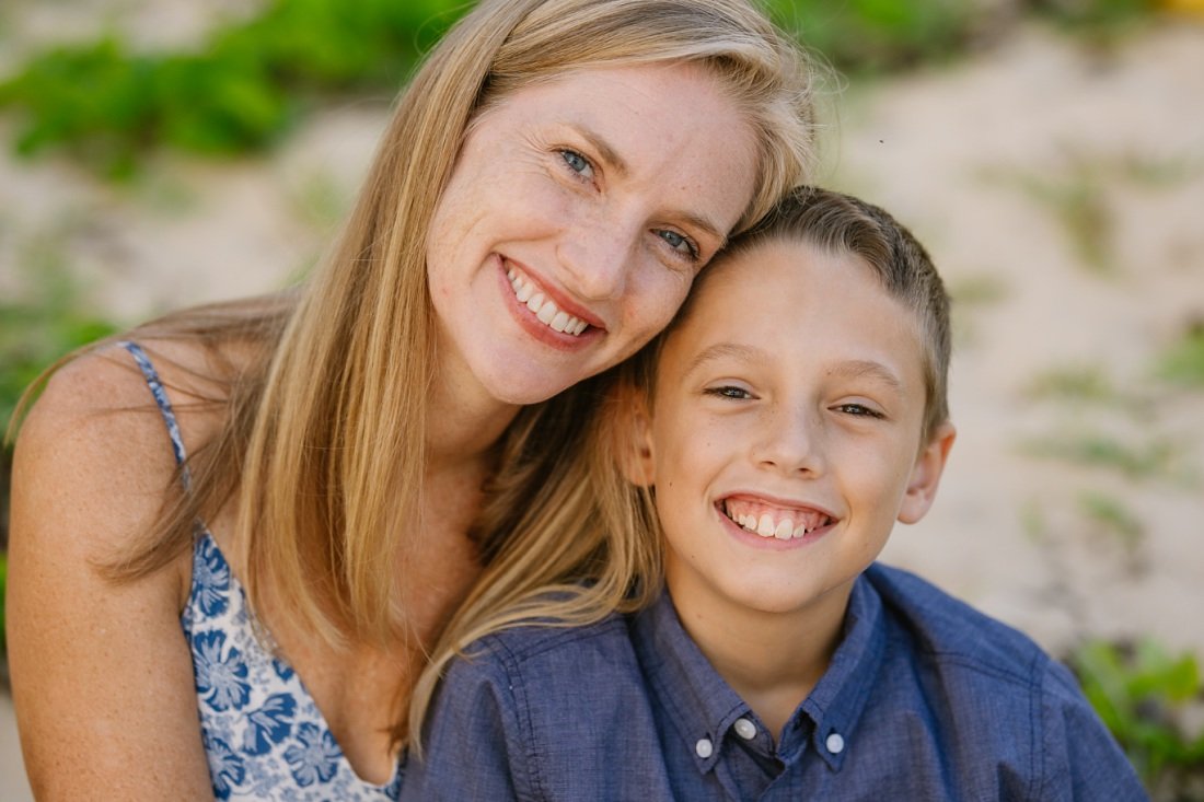 portrait of mom and son smiling