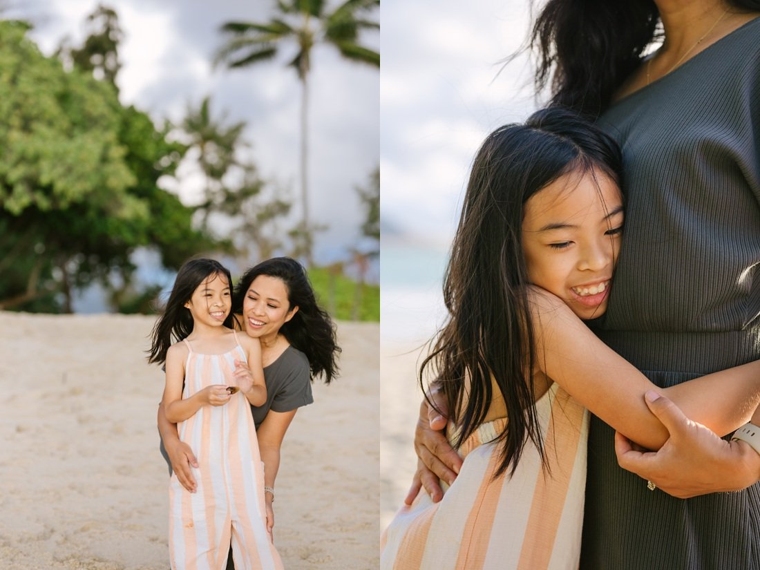 mom and daughter snuggle during a kailua family photo session