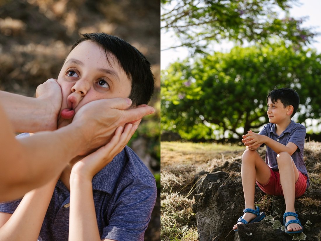 squishing boys cheeks during a fun photo session in hawaii