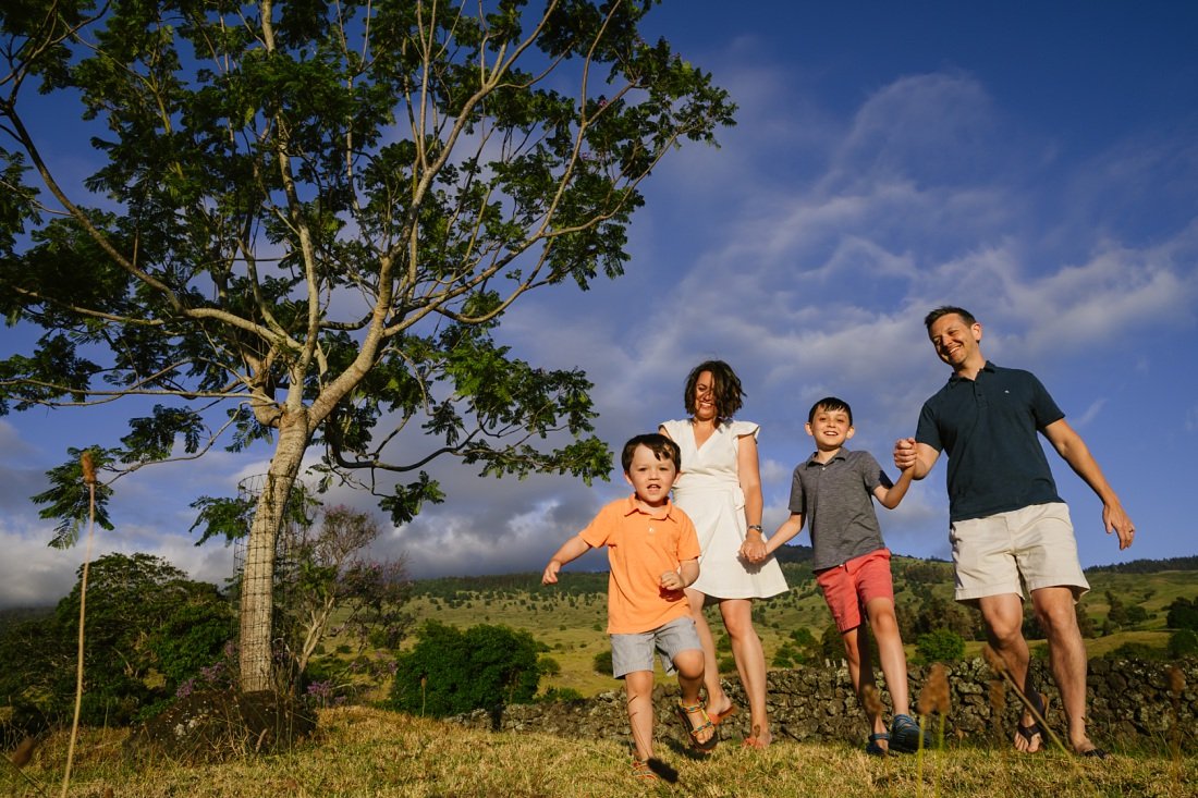 family walking at sunset in upcountry maui