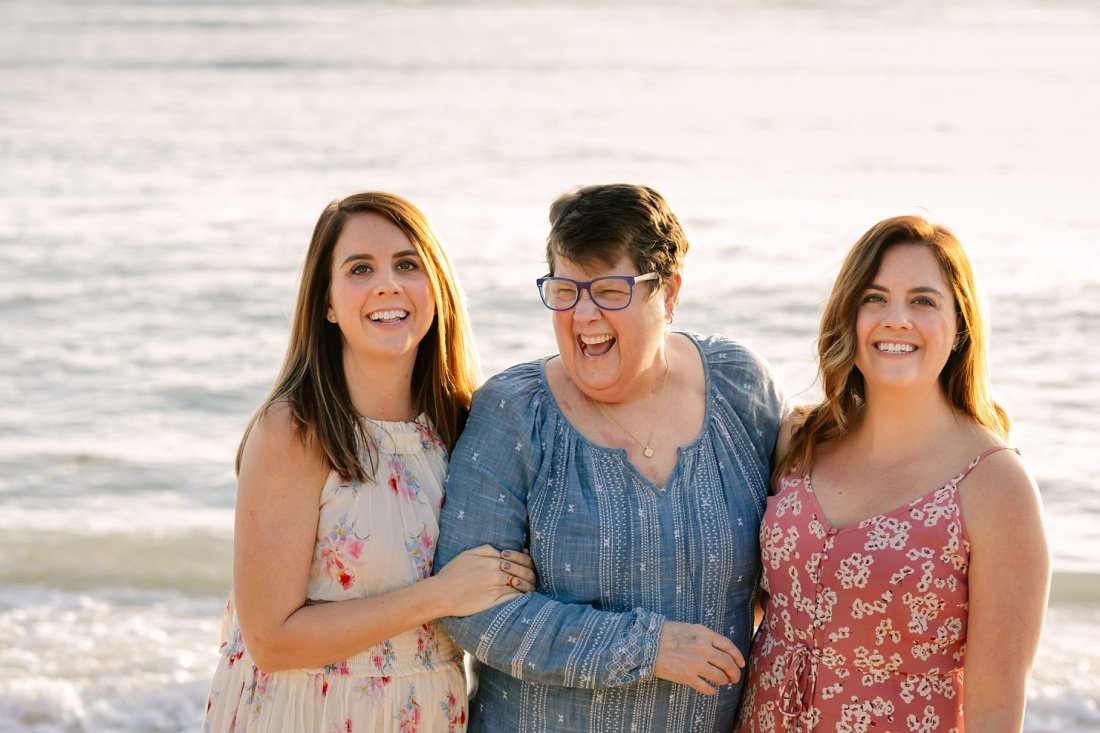 beach portrait of mom and adult daughters in hawaii