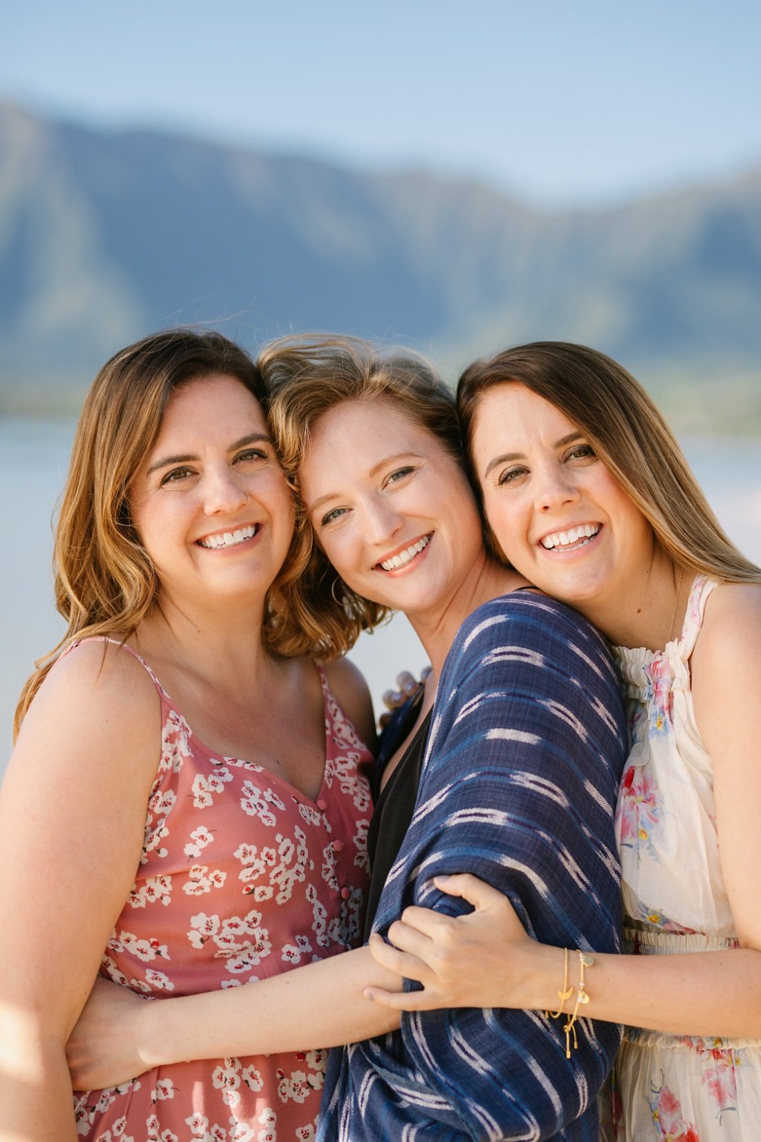 portrait of sisters at the beach in oahu during an extended family vacation
