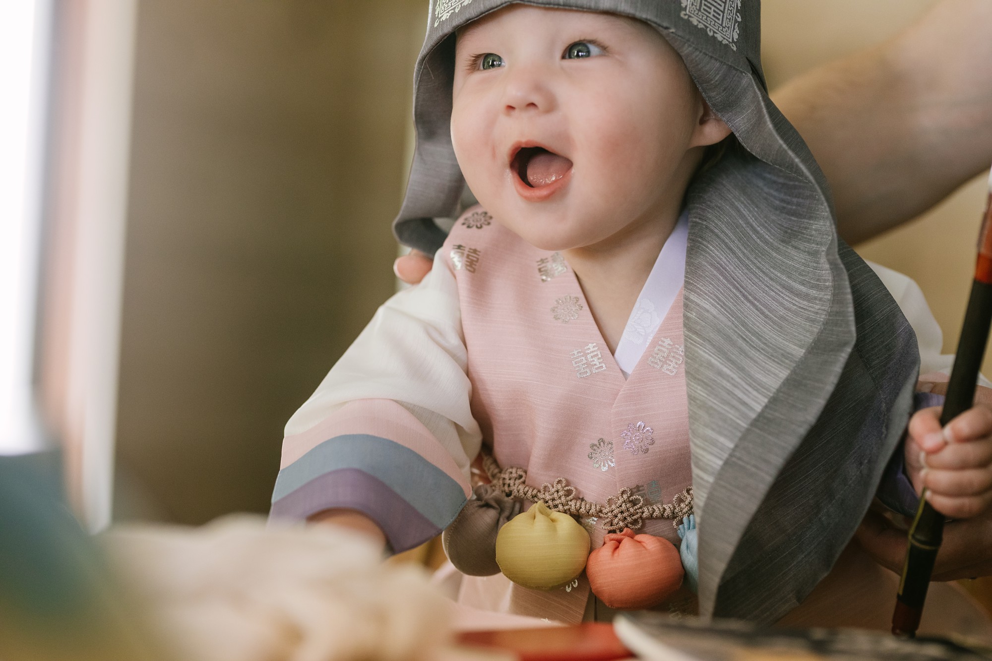 cute baby smiling during doljabi celebration at four seasons koolina
