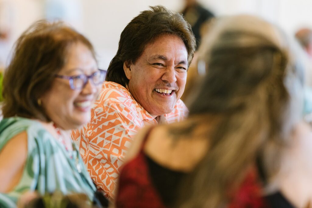 shared laughs around the table during a birthday luau