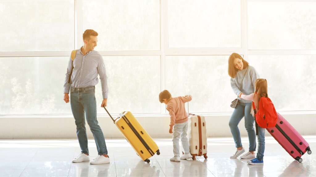 family of four at the airport