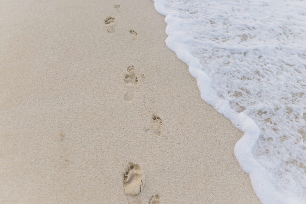 footprints in the sand on maui